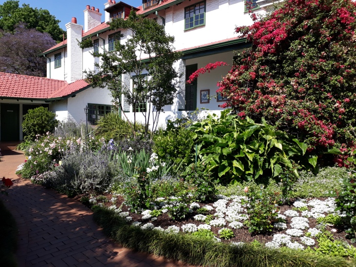 Roedean's beautiful heritage buildings, surrounded by gardens.
